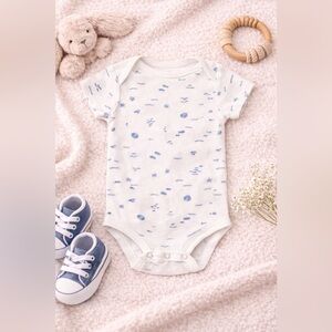 Blue and White Printed Baby Onesie
